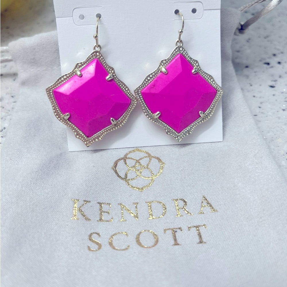 Kendra Scott earrings.